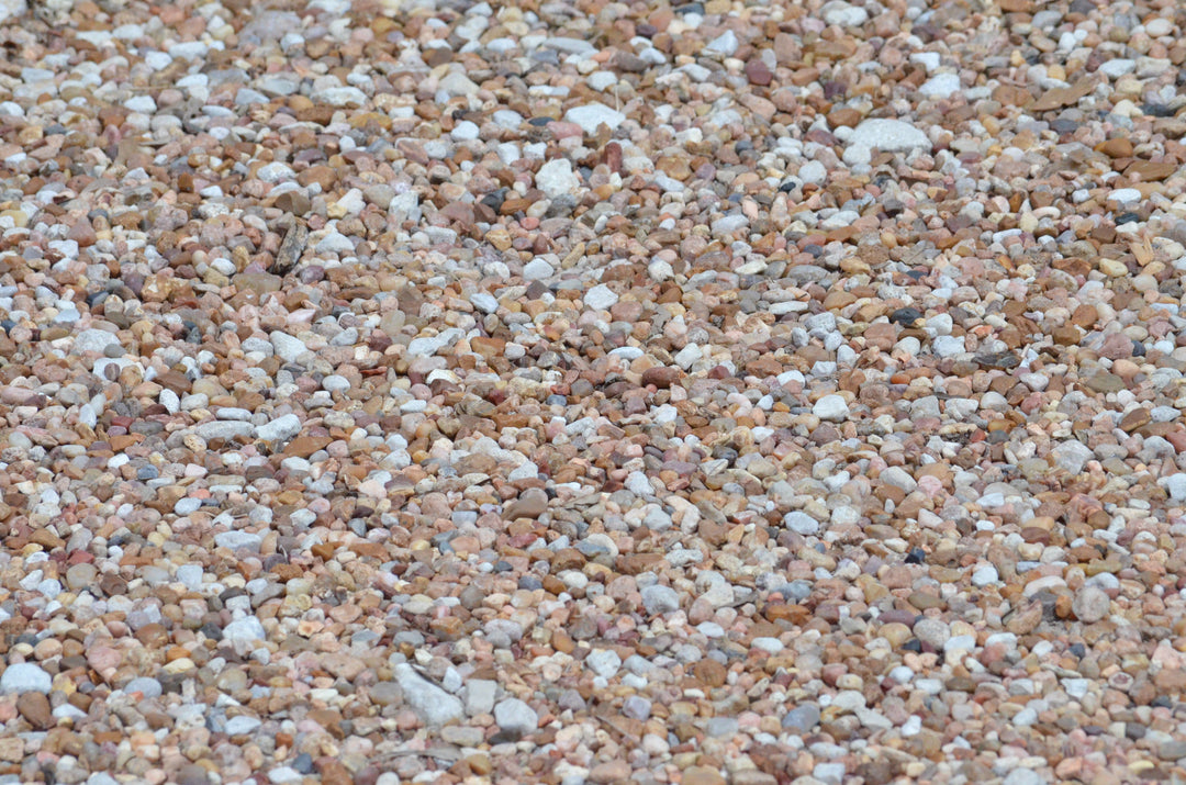 Don't Mulch with Rocks & What to Use Instead